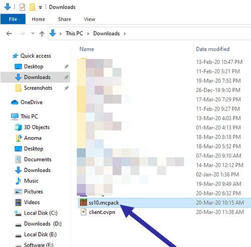 Mở File Explorer và tìm tệp đã tải xuống