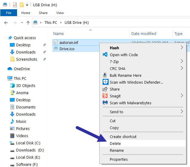 Chọn cả tệp Drive.ico và autorun.inf, nhấp chuột phải vào chúng và chọn tùy chọn Xóa