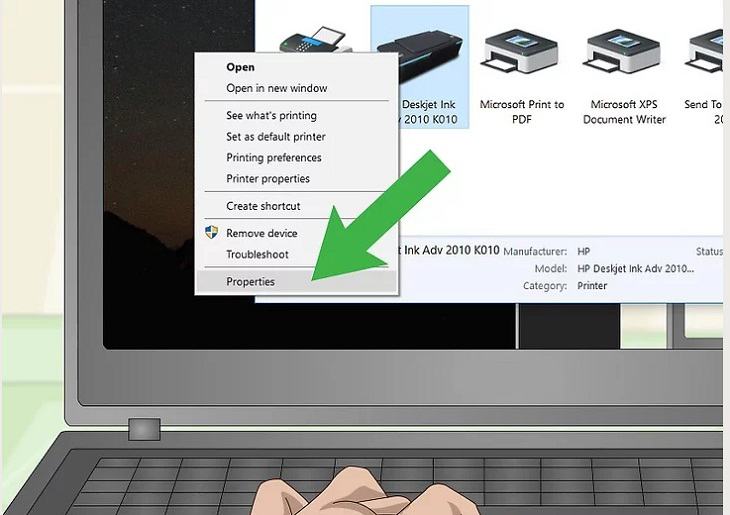 Nhấp chuột phải vào máy in và chọn Thuộc tính ở dưới cùng.